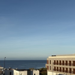 125030